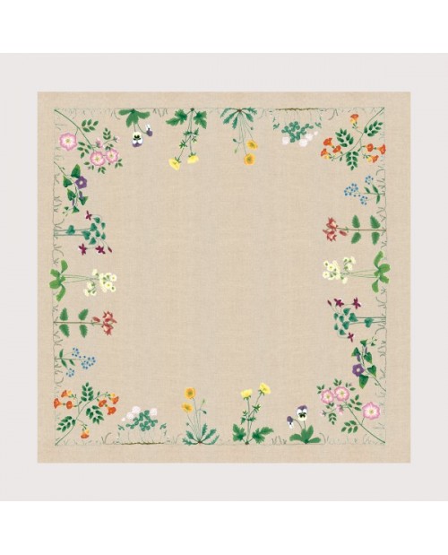 Linen tablecloth with flowers stitched along the perimeter of the tablecloth by traditional stitch. 6107