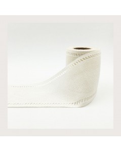 Roll of linen Aida band with open-worked edges.
