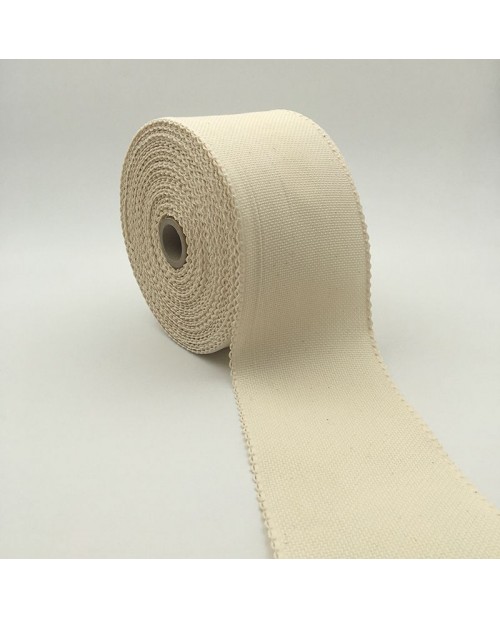 Roll of 7 points/cm Aida band. Ecru cotton band, 10 cm large.