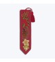 Bookmark stitched by counted cross stitch kit on red linen. Christmas Flowers. Le Bonheur des Dames 4590