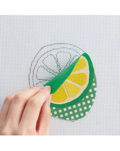 Enlevez l'appliqué du tapis. Clover