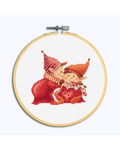 Two Christmas elves. Embroidery framed in a wooden hoop. Dutch Stitch Brothers DSB043G